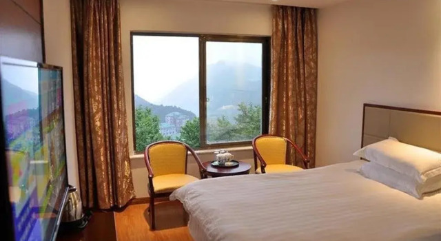 Wenxin 99 Business Hotel, Rezerwuj Hotel Jiujiang Jiangxi