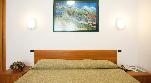 Четырёхместный номер Standard Hotel La Toscana