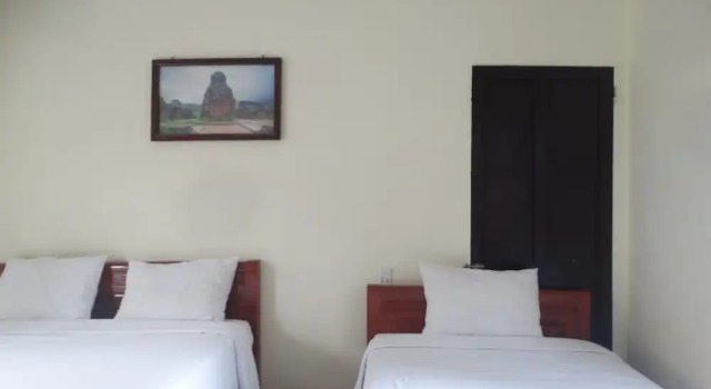 Трёхместный номер Standard с балконом и с видом на сад Yellow House Homestay