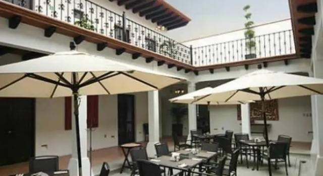 Кровать в общем номере Hotel Casa las Mercedes
