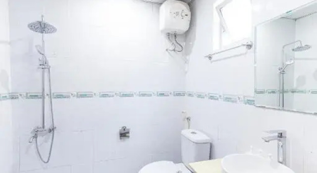 Кровать в общем номере De Huong Duong residences