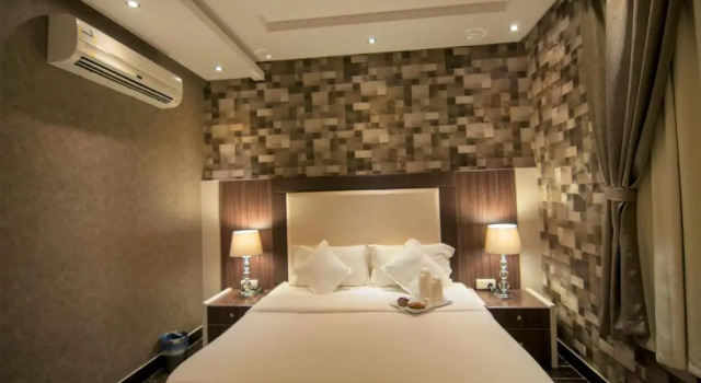 Люкс Deluxe Evan Serviced Apartments in Al Muruj District