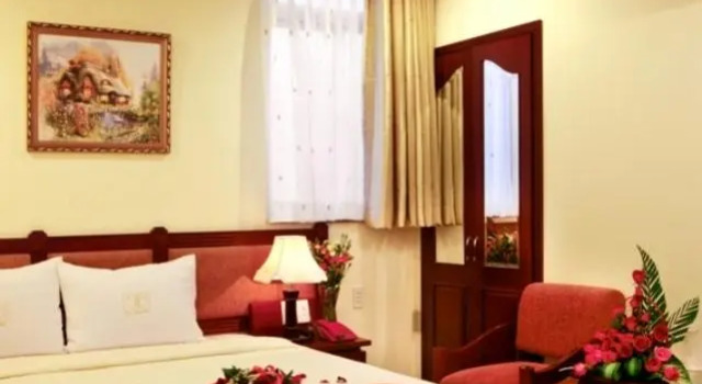 Четырёхместный номер Deluxe с красивым видом из окна Thien Thao Hotel