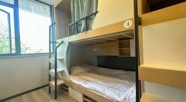 Кровать в общем номере Jitai Hotel Shanghai Zhonghuan Bailian Store