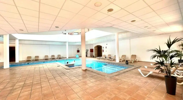 T1Standard Apartment with Wifi, AC and pool, well connected in the South of Tenerife, Забронировать Апартаменты/квартира Отели Сан-Мигель-де-Абона с парковкой, рядом с Playa Amarilla, Парковка