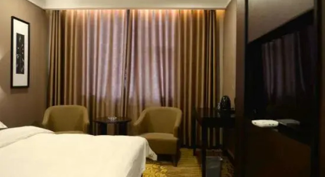 Junhua Wanjin Hotel (Zhumadian East Bus Station), Rezervovat Hotel Zhumadian Henan