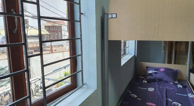 Кровать в общем номере (мужской номер) Nha Xanh Ha Long Homestay