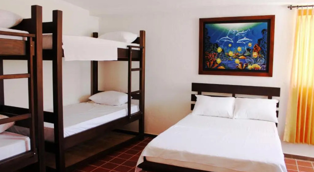 Кровать в общем номере Hotel San Marcos Taganga
