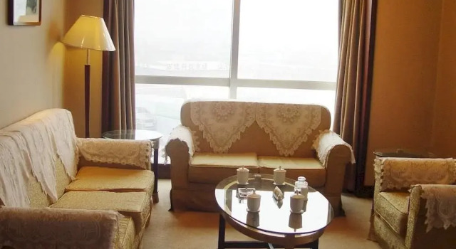 Dezhou World Hotel, Забронировать Отель Дежоу Шаньдун