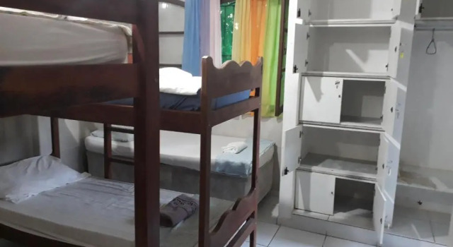 Кровать в общем номере Itaúna Hostel