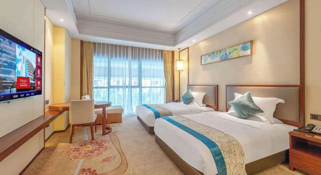 Четырёхместный номер Standard Ramada by Wyndham Kunming YiLiang