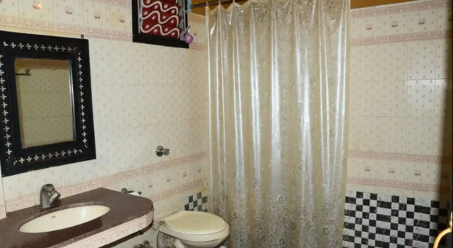 Кровать в общем номере Nakhrali Dhani Resort