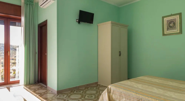 Трёхместный номер Comfort c 1 комнатой с балконом и с видом на бассейн B&B La Mortella