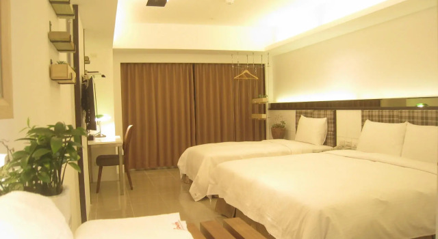 Кровать в общем номере Formosa Boulerard Garden Hotel