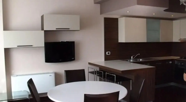 Кровать в общем номере с 2 комнатами Villa Palma