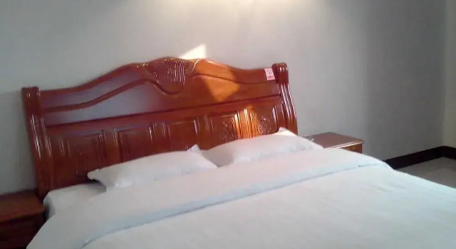 Longmen Hengtong Motel, Rezervovat Motel Longmen Henan