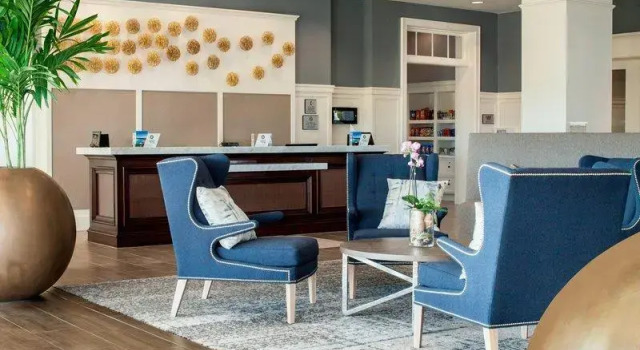 Кровать в общем номере Sheraton Jacksonville Hotel