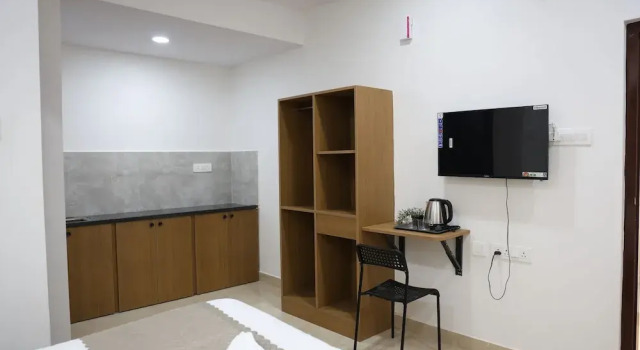 Номер Executive Innzoy Hotels - TNGO Colony