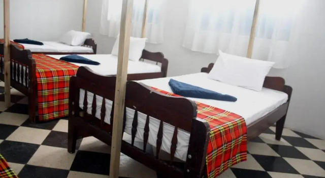 Кровать в общем номере Kimte Beach Lodge