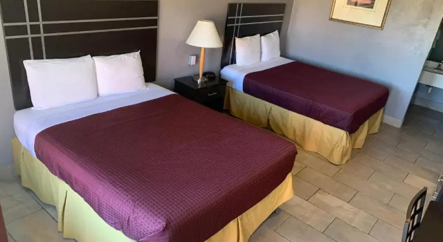 Четырёхместный номер Standard Executive Inn