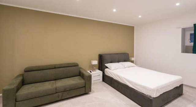 Четырёхместный номер Deluxe Suites Gaudioso Napoli center