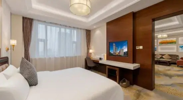 Люкс с 3 комнатами Shandong Yizheng Hotel