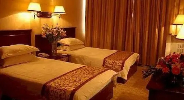 Jiaozuo Xingpeng Zhongzhou Holiday Hotel, Rezervovat Hotel Jiaozuo Henan