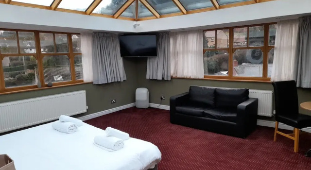 Четырёхместный номер Deluxe The Knighton Hotel
