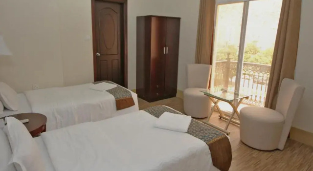 Апартаменты Delmon Hotel Apartments