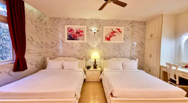 Четырёхместный номер Deluxe Tulip Hotel 3