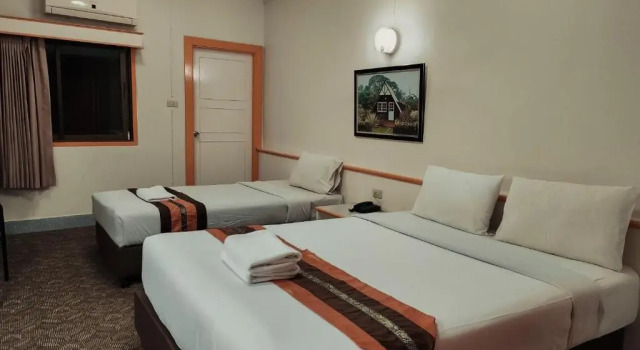 Номер Deluxe Asia Grand Hotel