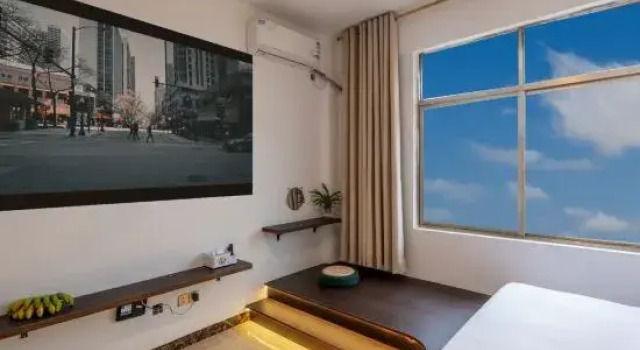 Кровать в общем номере Moyan Light Luxury Sea View Audio-Visual Homestay