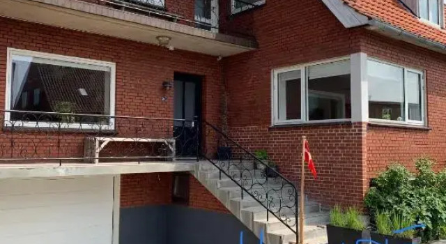 Selvbetjent lejlighed i centrum ved åen