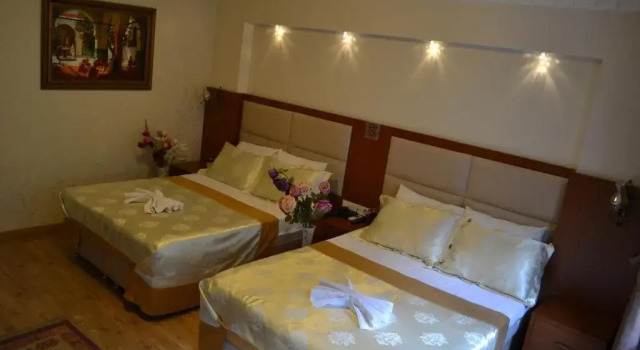 Четырёхместный номер Deluxe Taksim Peradise Hotel