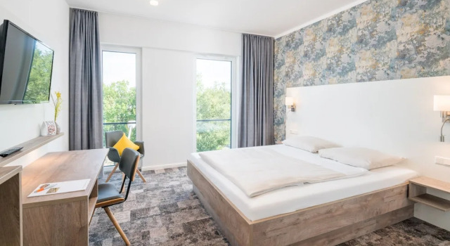 Номер Comfort Stadthotel Lohne, Self Check-in & entspannt im Café frühstücken