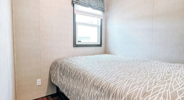 Коттедж с 4 комнатами Bellmere Winds Resort