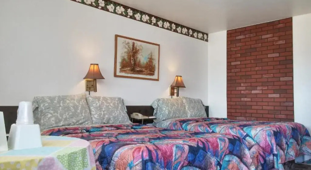 Четырёхместный номер Standard American Inn Motel Cañon City