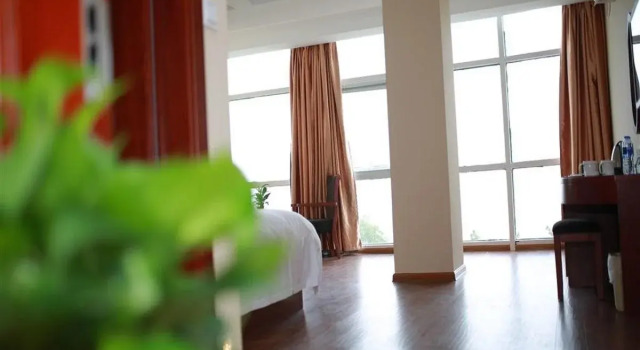 GreenTree Inn Jiangsu Suzhou Yangchenghu Qianshuiwan Express Hotel, Book Hotel Hoteller i Suzhou med parkering, Parkering