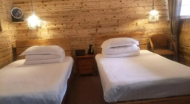 Семейный люкс Deluxe Nanjing Tulou Qingdelou Inn