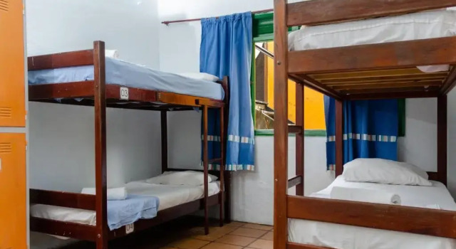 Кровать в общем номере Pousada Villas Boas Arraial do Cabo
