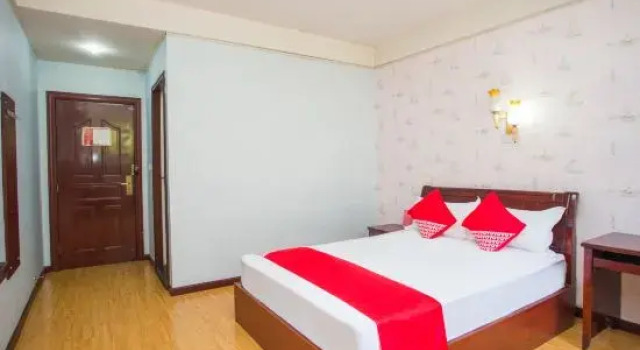 Номер Standard Oyo Desheng Hotel