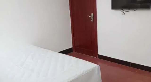 Кровать в общем номере Hongyu Farm House