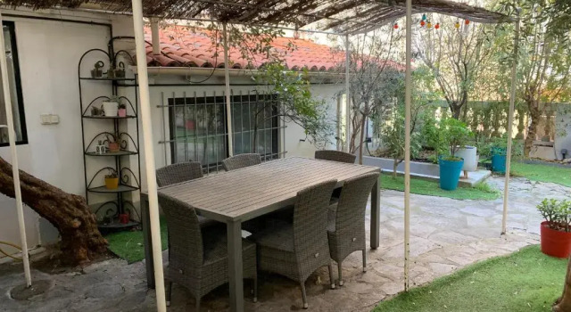 Апартаменты Appartement avec jardin en centre ville