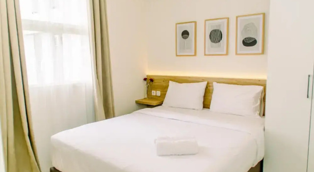 Modern And Homey 1Br Apartment At Tuscany Residences, Book Apartment Hotels in South Tangerang with a Pool, Swimming Pool
