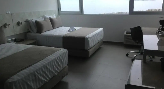 Четырёхместный номер Standard рядом с пляжем Hotel Punta Azul