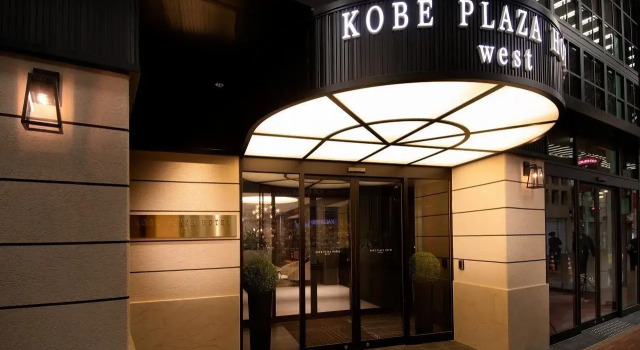 Кровать в общем номере Kobe Plaza Hotel West