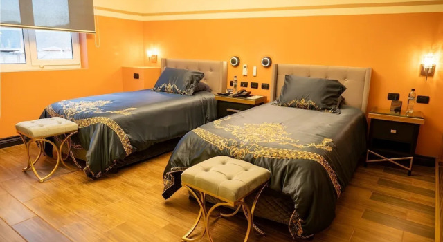 Кровать в общем номере Hotel Palmera Dorada