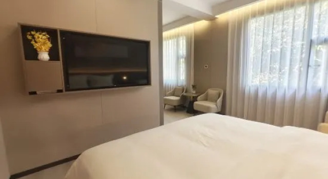 Люкс Longjiang Yishe Hotel (Baima Pedestrian Street)