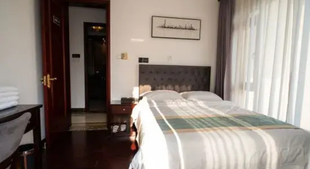 Люкс с 4 комнатами Qidong Haishangju Holiday Apartment (Hengda Venice)