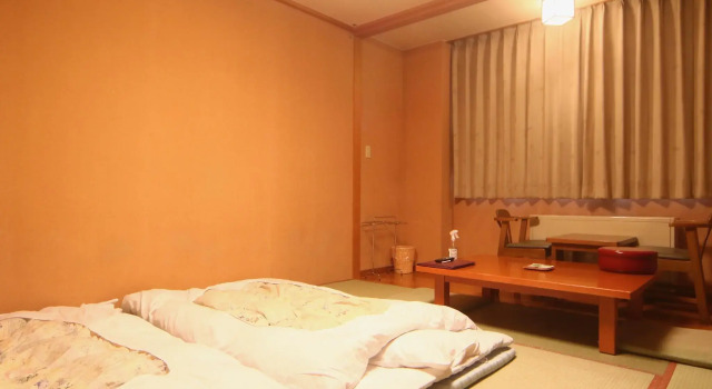 Номер Standard с красивым видом из окна Tokachidake Onsen Ryokan Kamihoroso